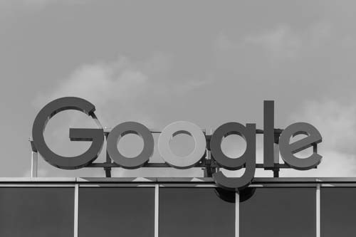 Photo of the Google logo used for signage on a building.