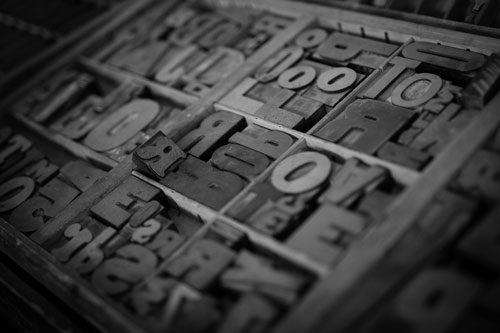 Photo of vintage type to make words for print with a printing press.