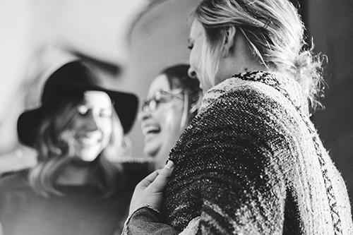 Photo of friends talking.